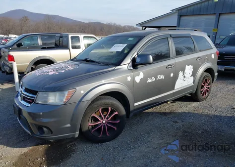 2013 Dodge Journey Sxt z USA, uszkodzony, nr VIN 3C4PDDBG8DT571295